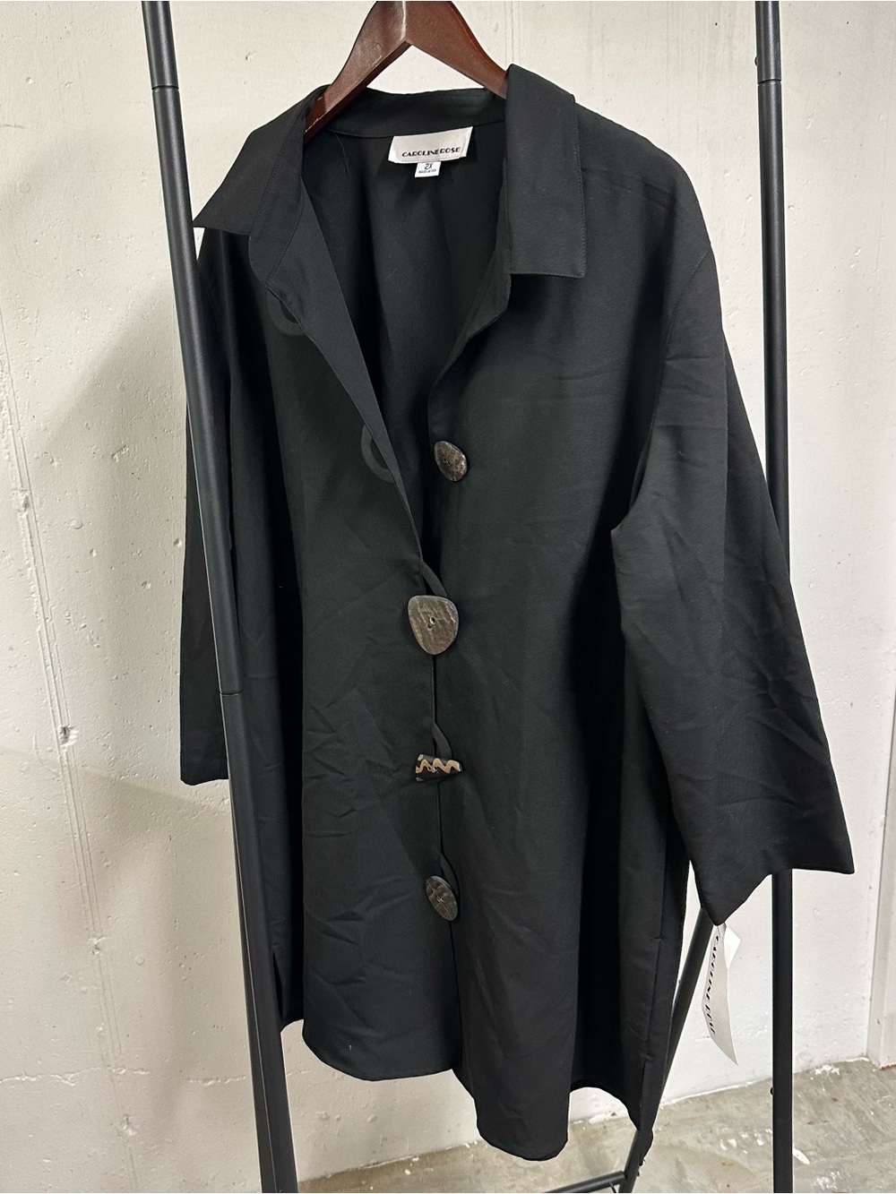 Black Button-Front Trench Coat by Caroline Rose